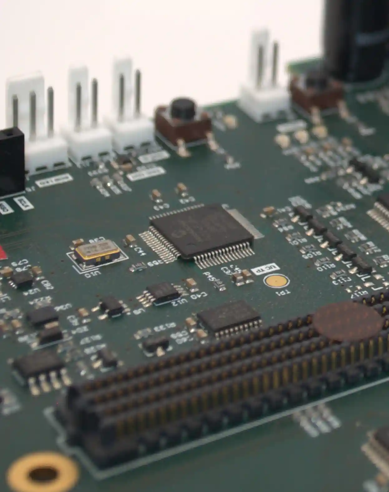 Embedded supervisory microcontroller and real-time control circuitry on the custom carrier board